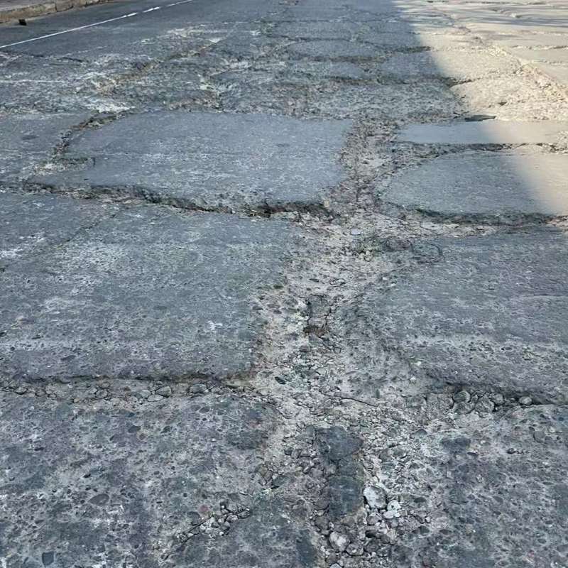 黔西路面起砂露石子修补料